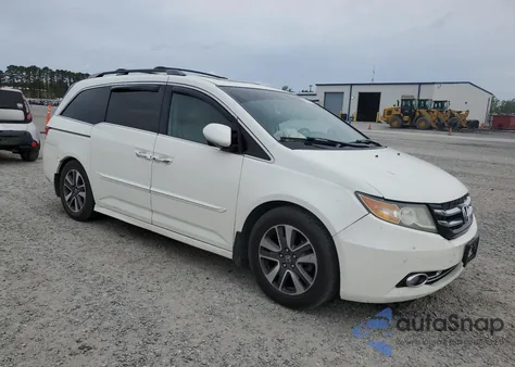 2015 Honda Odyssey Touring z USA, uszkodzony, nr VIN 5FNRL5H94FB035228